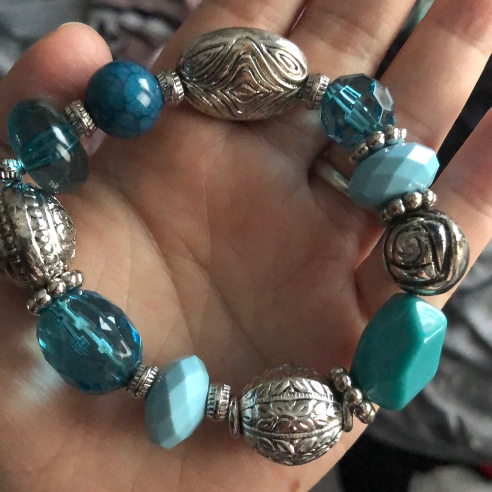 Teal and silver colored bracelet